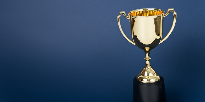gold award on a blue background